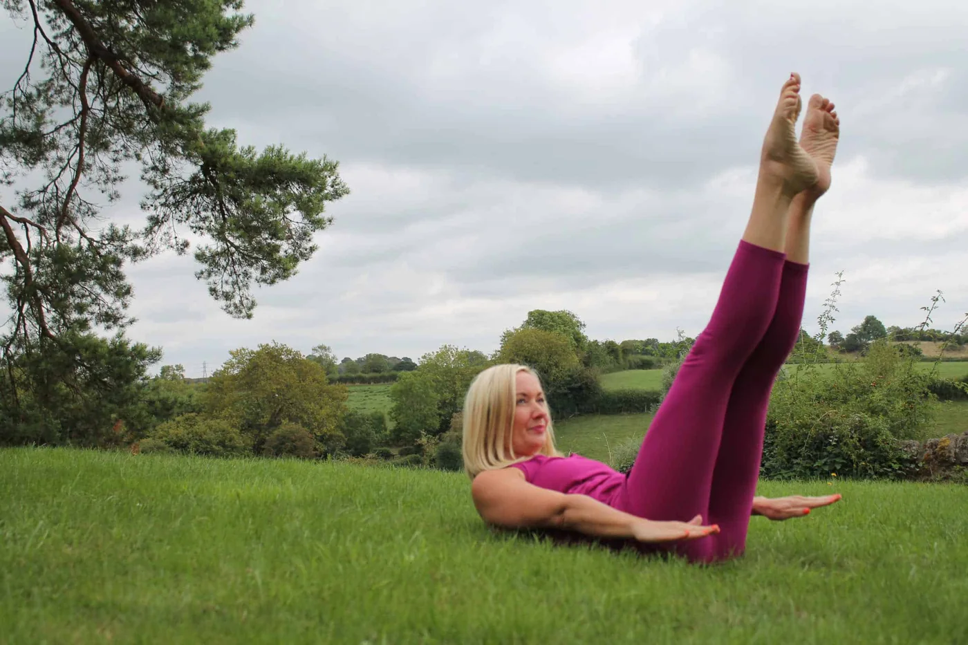 Caroline practising Pilates outdoors