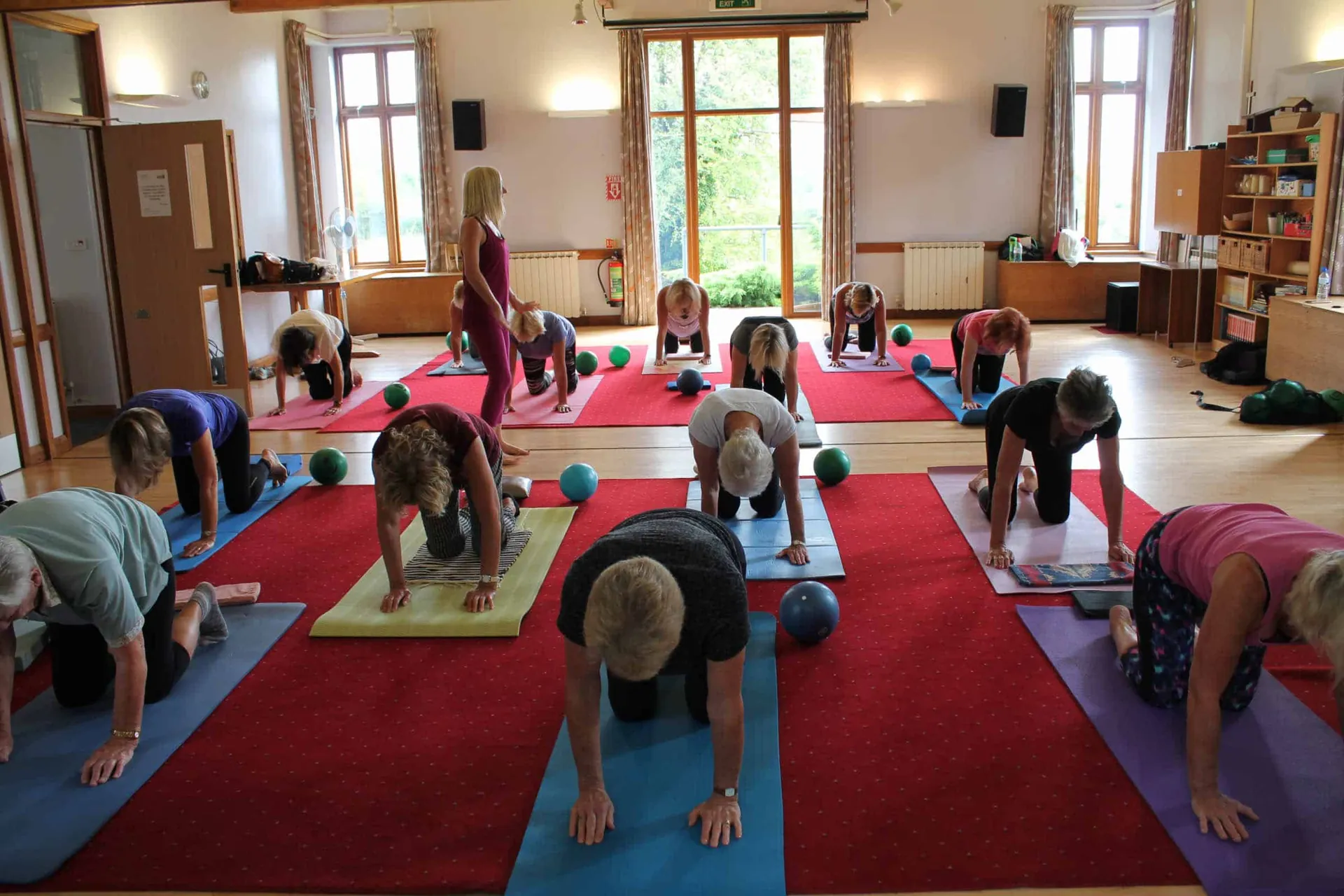 Caroline teaching a group Pilates class